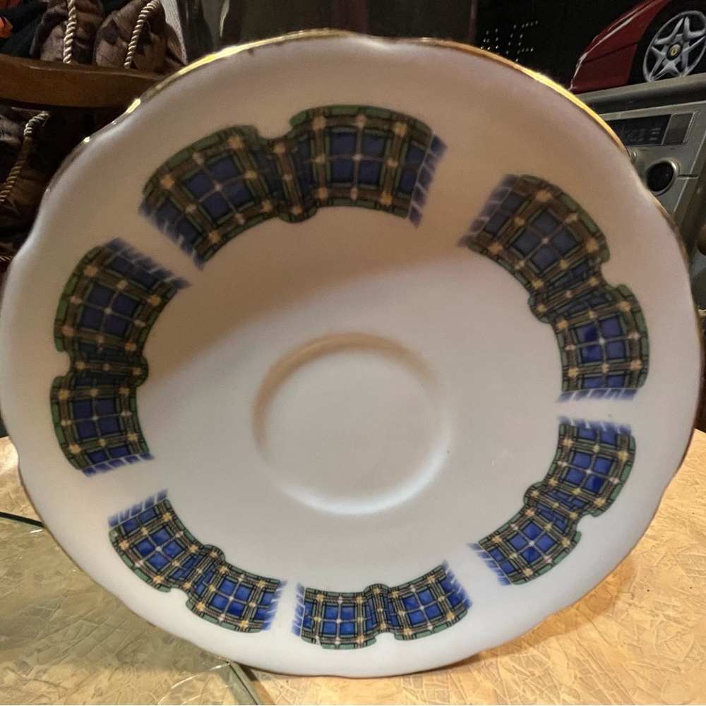 Elegant Blue and Gold Patterned Saucer